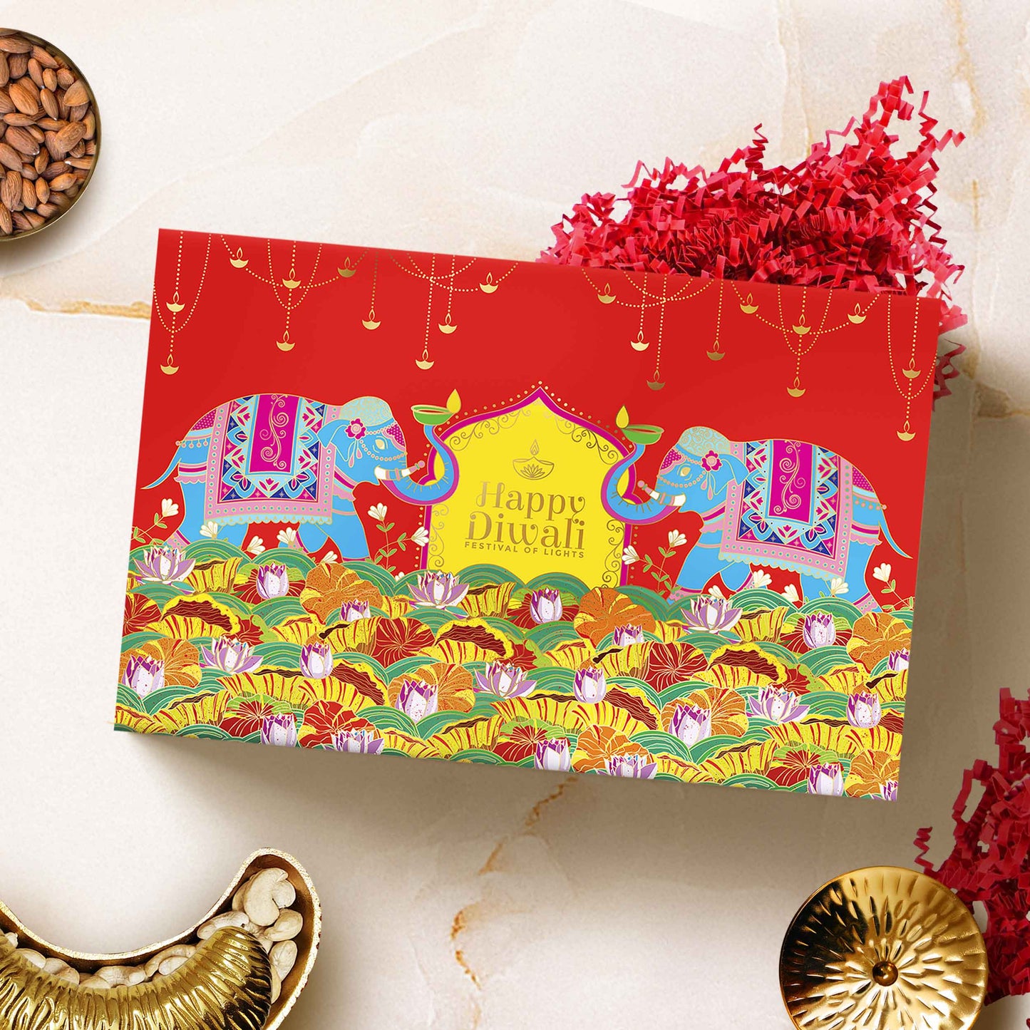 Close-up of handcrafted brass thali platter and chocolates in the Luxury Opulence Diwali hamper