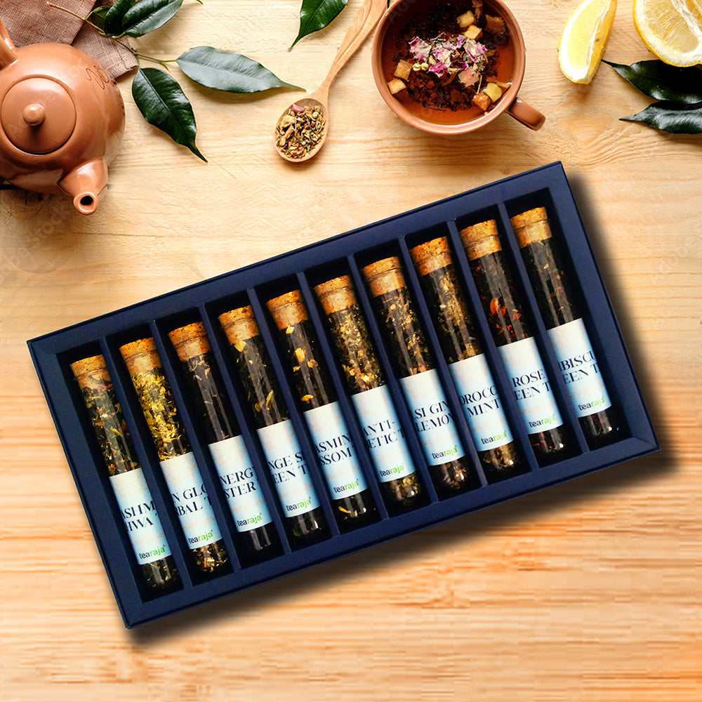 Inside view of Aurora Box showcasing 10 exotic organic teas in test tubes with a personalized message card