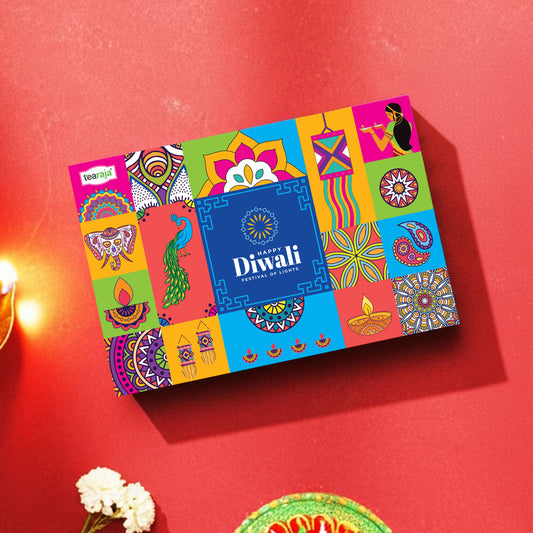 Premium Diwali gift hamper – The Cracker Box by The Happiness Story, festive kappa board packaging with colorful Diwali theme artwork.
