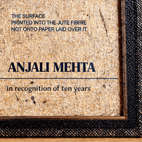 Close-up of a certificate printed directly into natural jute fibre board, showing individual fibres and flecks running through the lettering