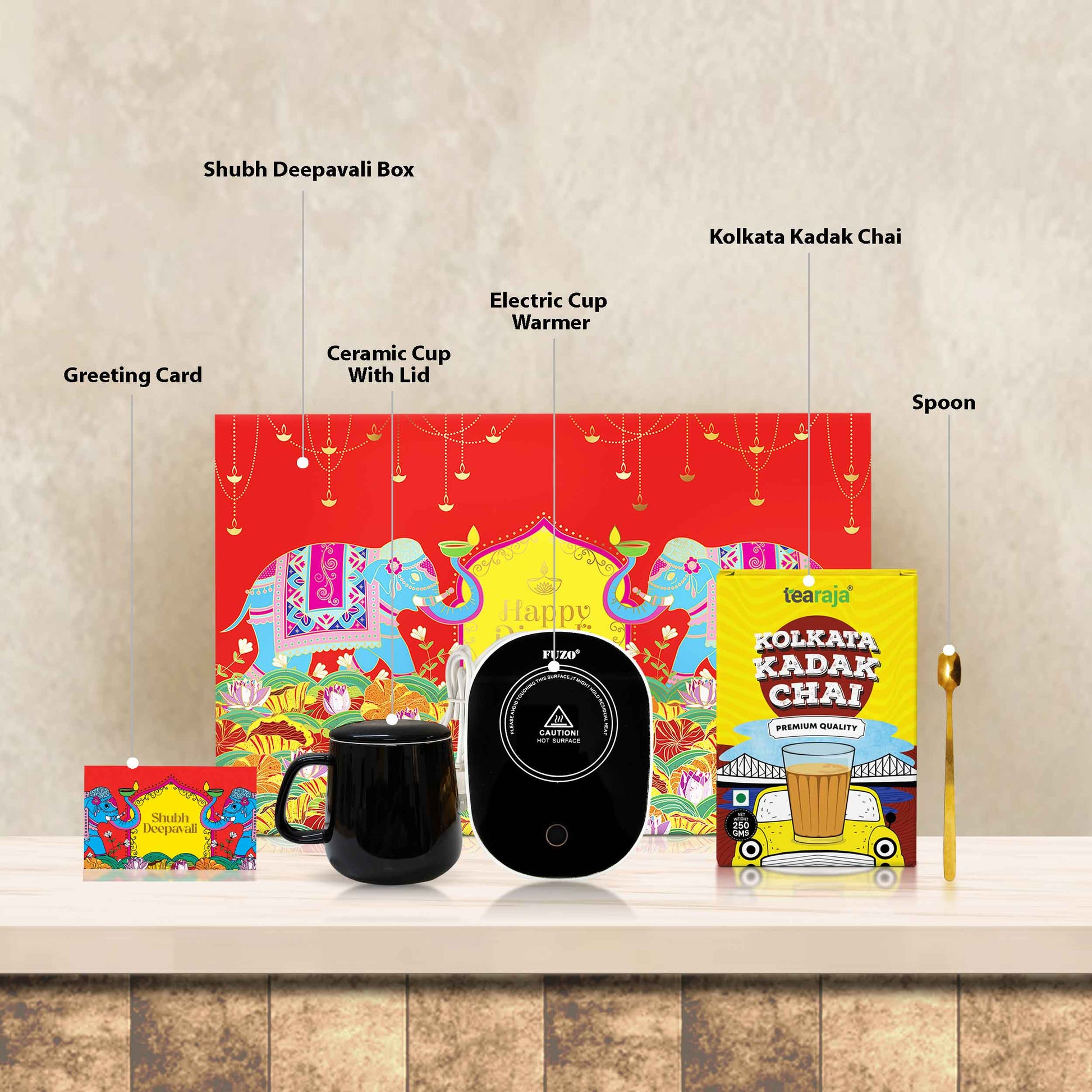 Open Chai Lover Box showing curated gourmet teas, premium snacks, and festive accessories inside