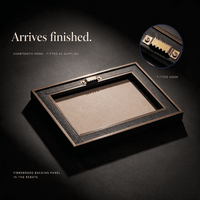 Back of the A4 appreciation certificate frame showing the fitted brass sawtooth hanging hook and fibreboard backing panel