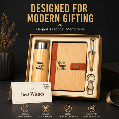 Premium bamboo corporate gift set styled for modern gifting — bamboo flask, bamboo-finish organiser with leather strap, bamboo pen and keychain