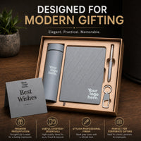 Grey Fusion tonal grey gift set styled for modern gifting — grey flask, textured notebook, grey-grip pen, keychain and greeting card
