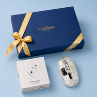 Close view of the corporate tech hamper contents — a sealed Apple AirPods Pro carton and a transparent wireless mouse with its circuit board and switches visible through the shell