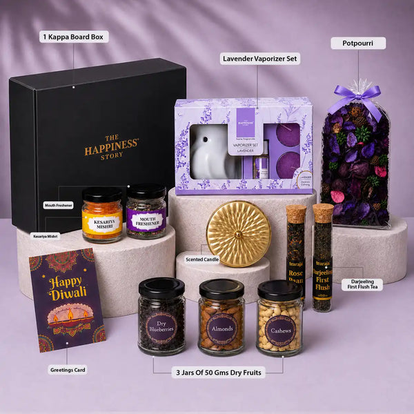 Labelled contents of the Sugandh Diwali hamper — one kappa board box, lavender vaporizer set, potpourri, scented candle, kesariya mishri, mouth freshener, two teas, greeting card and three 50g dry fruit jars
