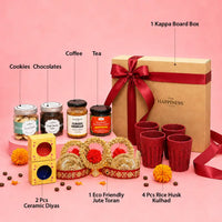 Labelled contents of the Diwali tea and coffee hamper — cookies, chocolate cookies, coffee, tea, one kappa board box, two ceramic diyas, one eco friendly jute toran and four rice husk kulhads