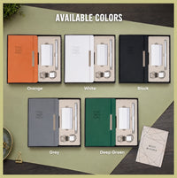 Elastic Pro notebook gift set available in five colours — orange, white, black, grey and deep green with matching accessories