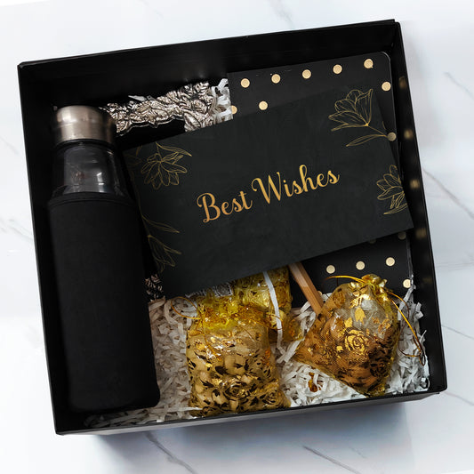Affinity Luxe Box – premium black gift box with golden ribbon, closed view
