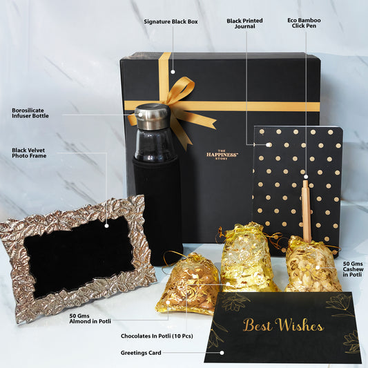 Open Affinity Luxe Box showing contents: infuser bottle, journal, pen, frame, nut potlis, chocolates