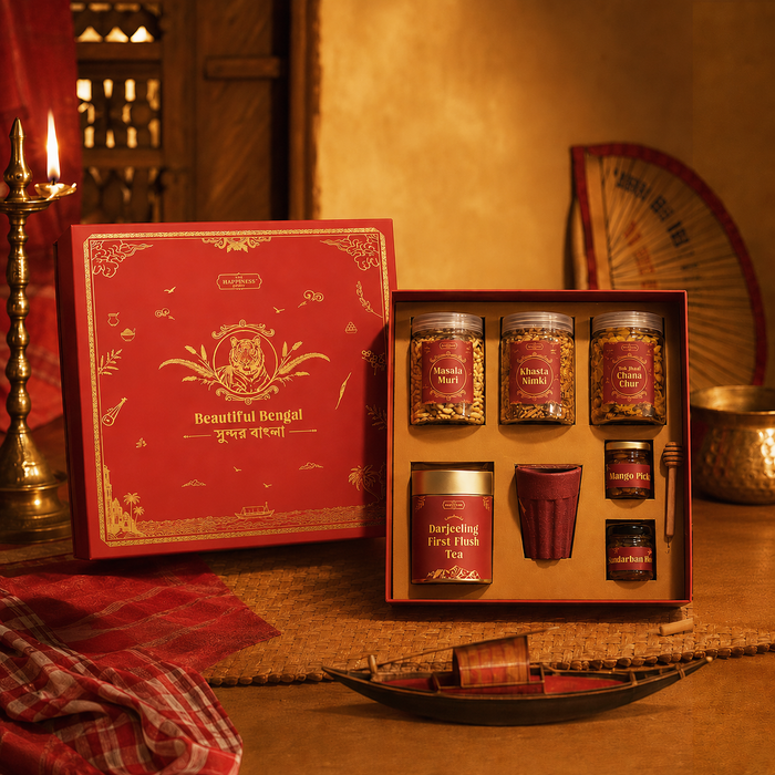 The Beautiful Bengal Box open — foil-stamped red lid with all nine Bengal-sourced items revealed inside