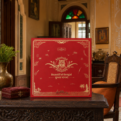 The Beautiful Bengal Board Box — foil-stamped red and gold gift box with Royal Bengal Tiger emblem