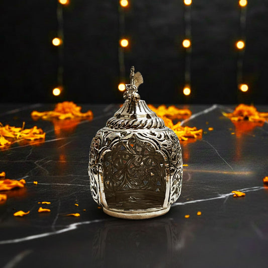 Intricate silver tealight holder with peacock design, cultural luxury gift.