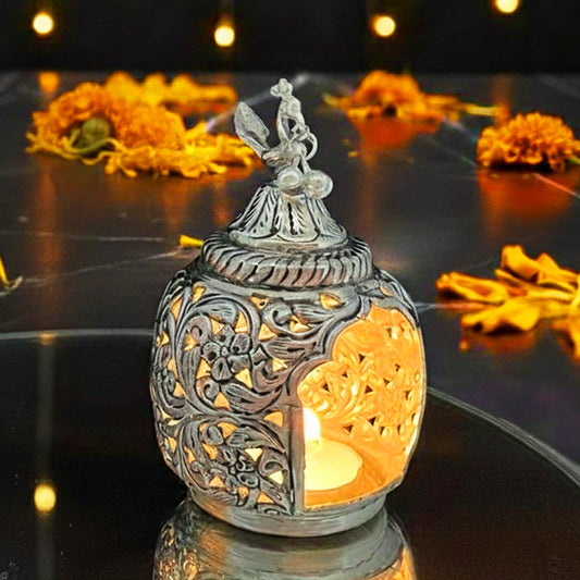 Handcrafted German Silver Peacock T-Light Holder glowing with festive charm.