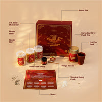 Beautiful Bengal Box contents infographic — Tok Jhaal Chanachur, Khasta Nimki, Masala Muri, Darjeeling First Flush Tea, Sunderban Honey, Mango Pickle, Eco Rice Husk Cup and Wooden Honey Comb 