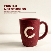 Rice husk coffee mug with a single-colour logo screen printed on the body, front view