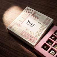 Chocolate gift box lid printed with a company logo for corporate branding, open tray alongside
