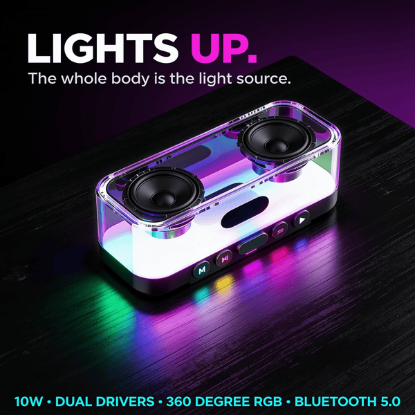 Transparent RGB Bluetooth speaker glowing from within on a dark wooden surface, two drivers and the 360 degree light show visible through the clear body