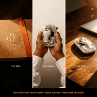 Gift box, unboxing and desk views of the transparent wireless mouse, a branded corporate gift for teams with pan-India bulk delivery